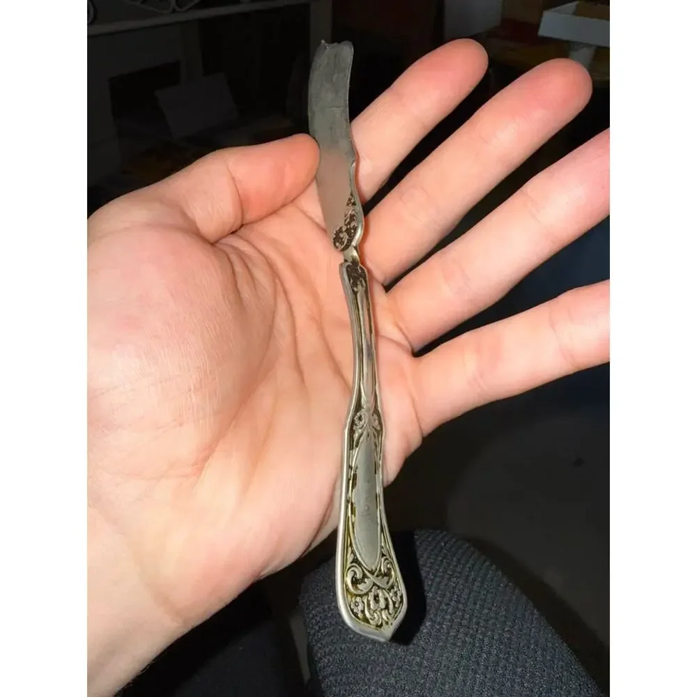 Antique Wm. Rogers Silverplate Twisted Butter Knife